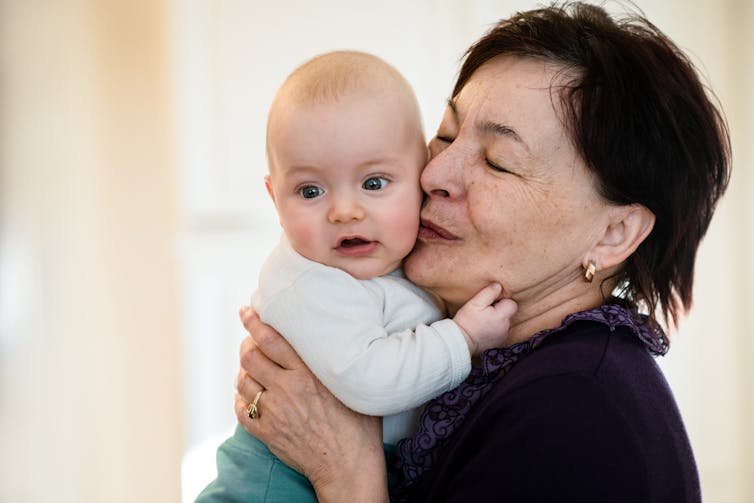 Grandmother holding baby