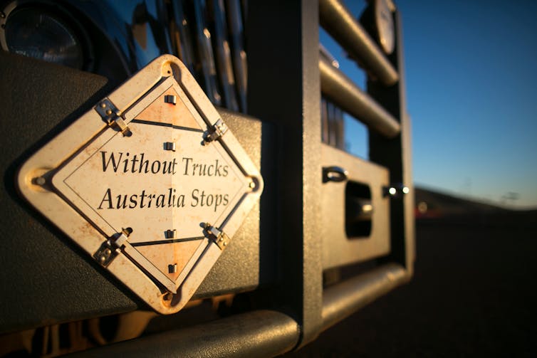 front of truck with sign saying without trucks Australia stops