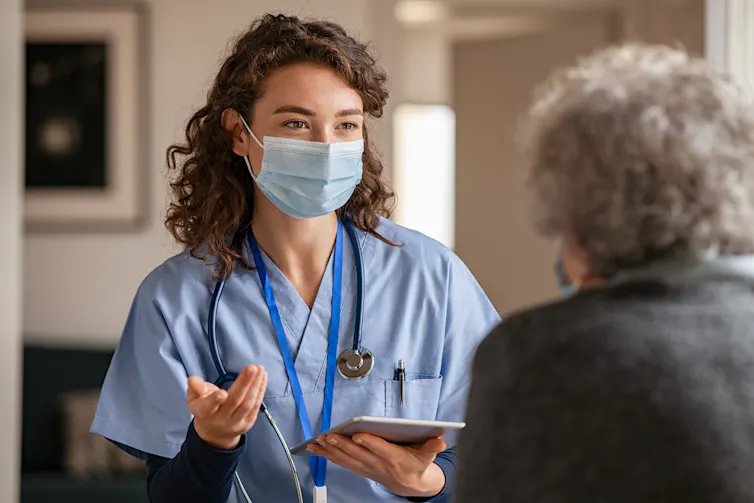 Doctor talks to patient