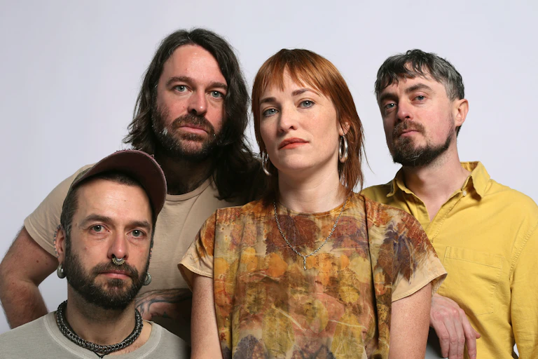 three men and a woman – the band members of Lankum
