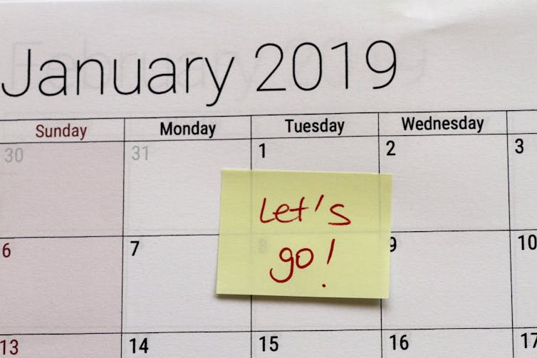 January calendar page with 'Let's go!' sticky note on the first of the month