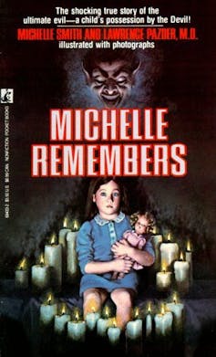 Cover of book featuring sinister devil looming over a girl clutching a doll.