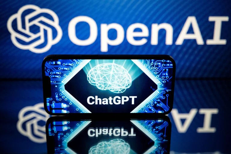 A horizontal smartphone upright on a reflective surface with its screen displaying a graphical representation of a human brain