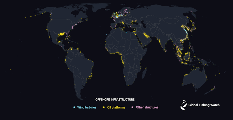 World map with locations of wind turbines, oil and gas platforms and other structures highlighted along coastlines.