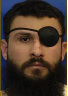 Mugshot of Abu Zubaydah, a young man with a thick beard and an eyepatch over his left eye