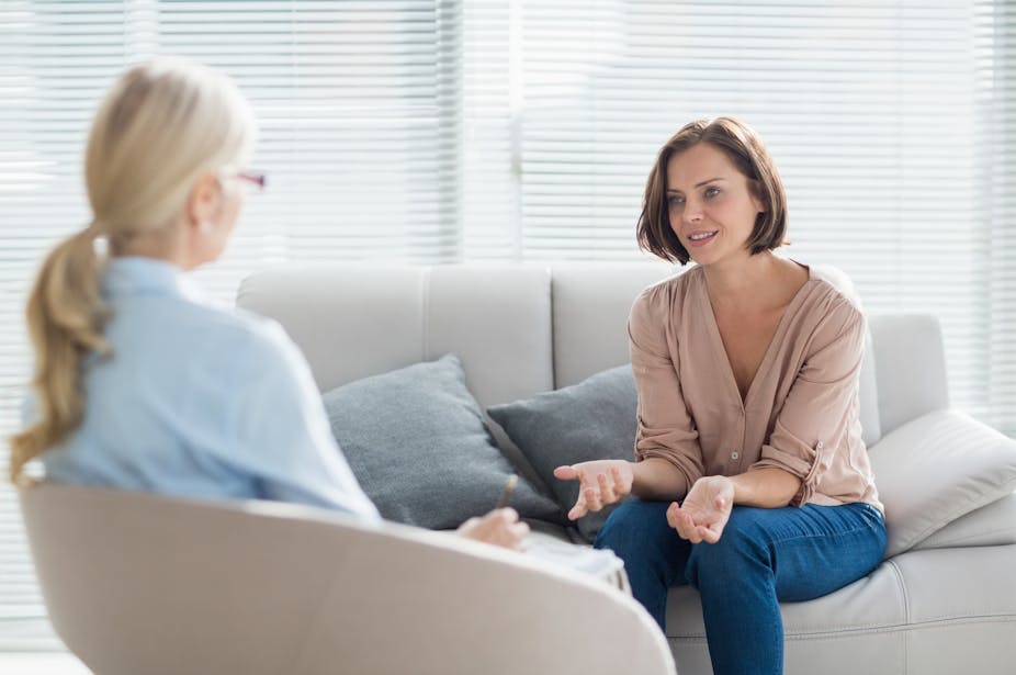 A woman speaks to her female therapist.