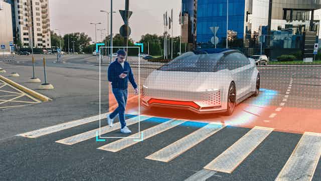 Self-driving car stopped at crossing (concept).