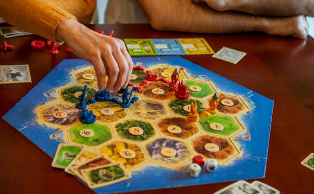 What's unsettling about Catan: How board games uphold colonial