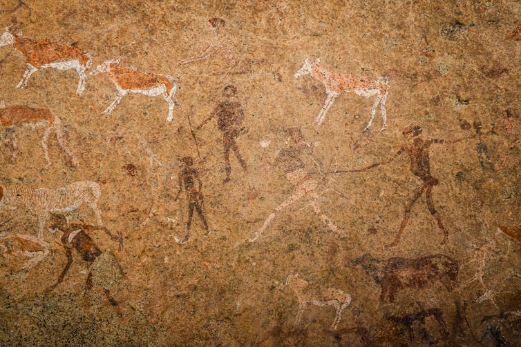 Cave painting of hunter gatherers