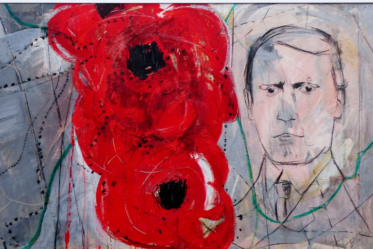 A mural depicting the face of a man next to two large illustrations of poppies.