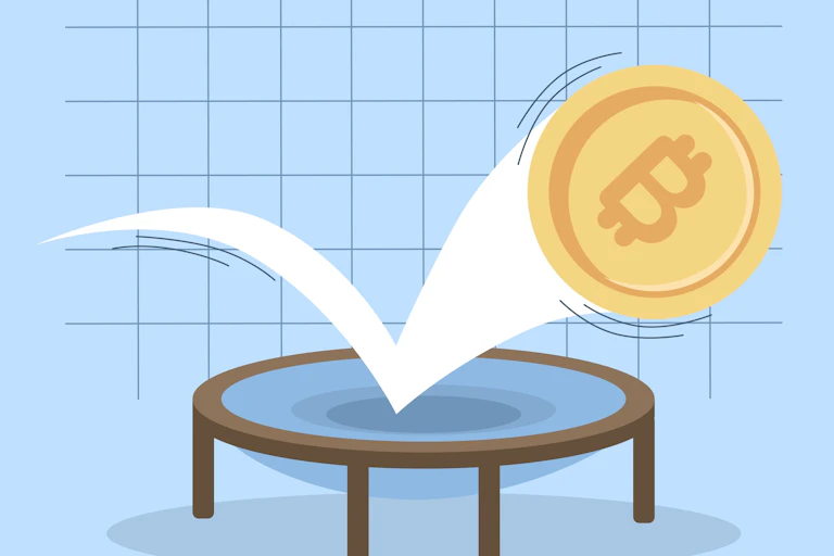An illustration of a bitcoin bouncing on a trampoline