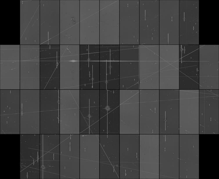 a series of grey boxes with white streaks