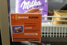 Sign pinned to a supermarket fridge door