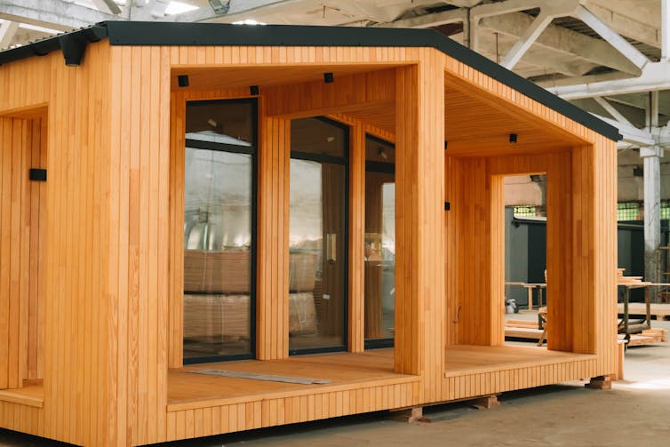 A house constructed from prefabricated timber parts.