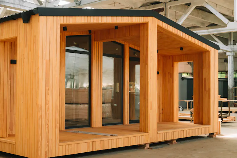 A house constructed from prefabricated timber parts.