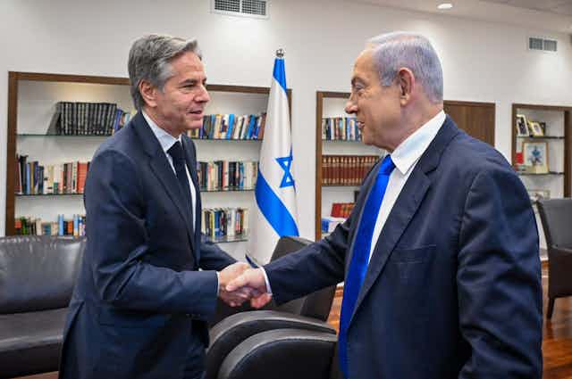 US secretary of state, Antony Blinken, shakes hands with Israeli prime minister Benjamin Netanyahu, Tel Aviv, January 2024.