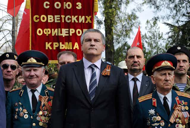 The head of Crimea's Russian-backed government Sergey Aksyonov, at a military ceremony.