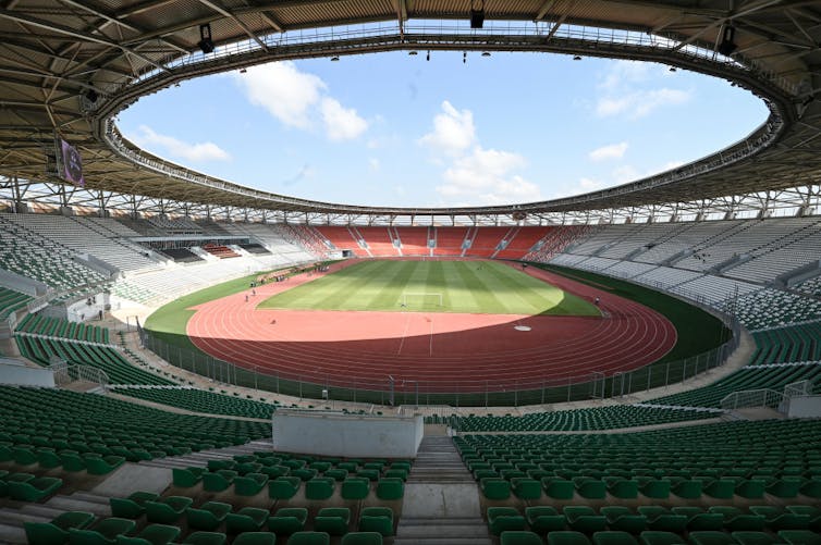 A new sports stadium, a circle in the roof open to the elements.