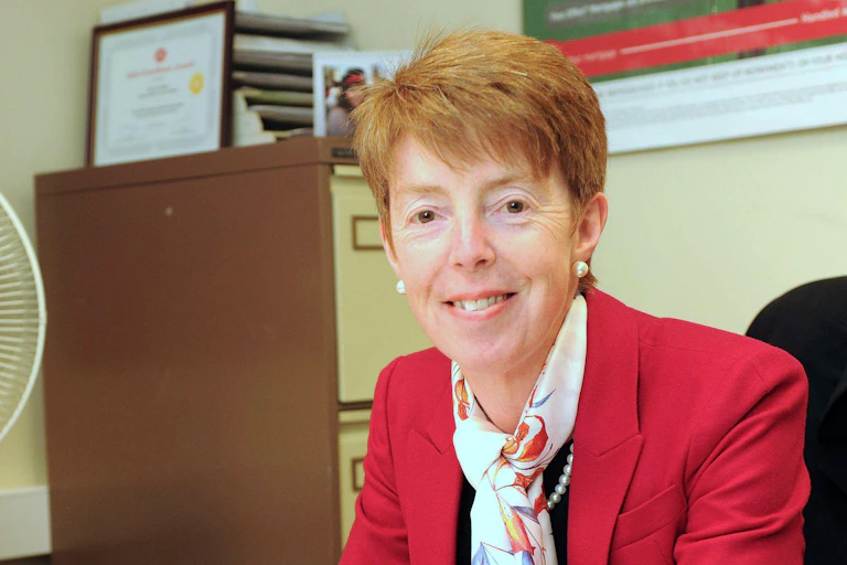 Paula Vennells sitting at her desk.