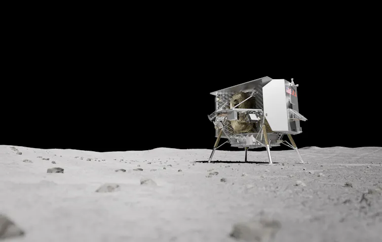 a cube-like robot on a grey surface