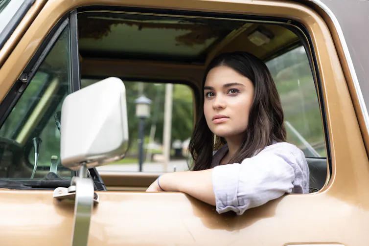Bonnie sat in a truck.