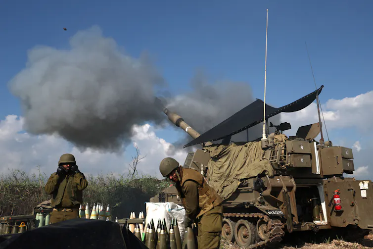 An Israeli artillery unit fires towards a target in Lebanon.