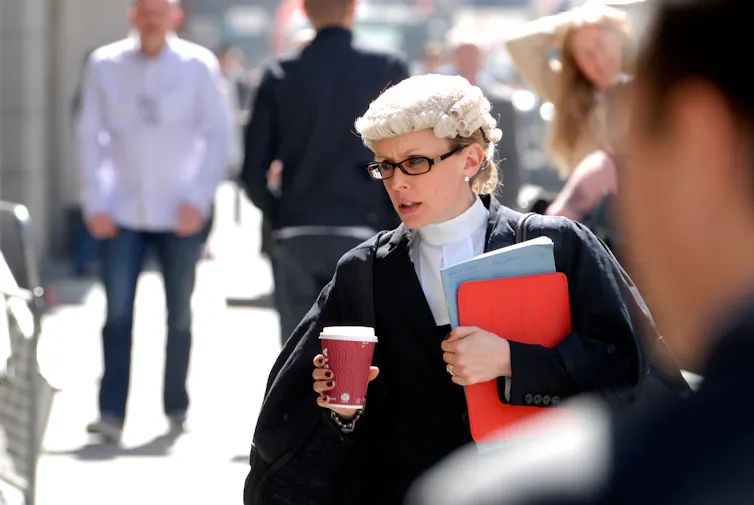 Barrister with a coffee outside