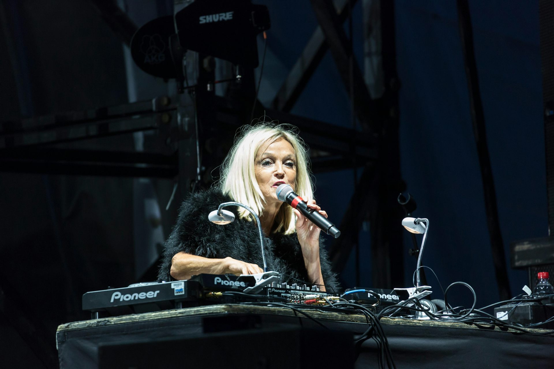 Annie stood at a DJ deck.