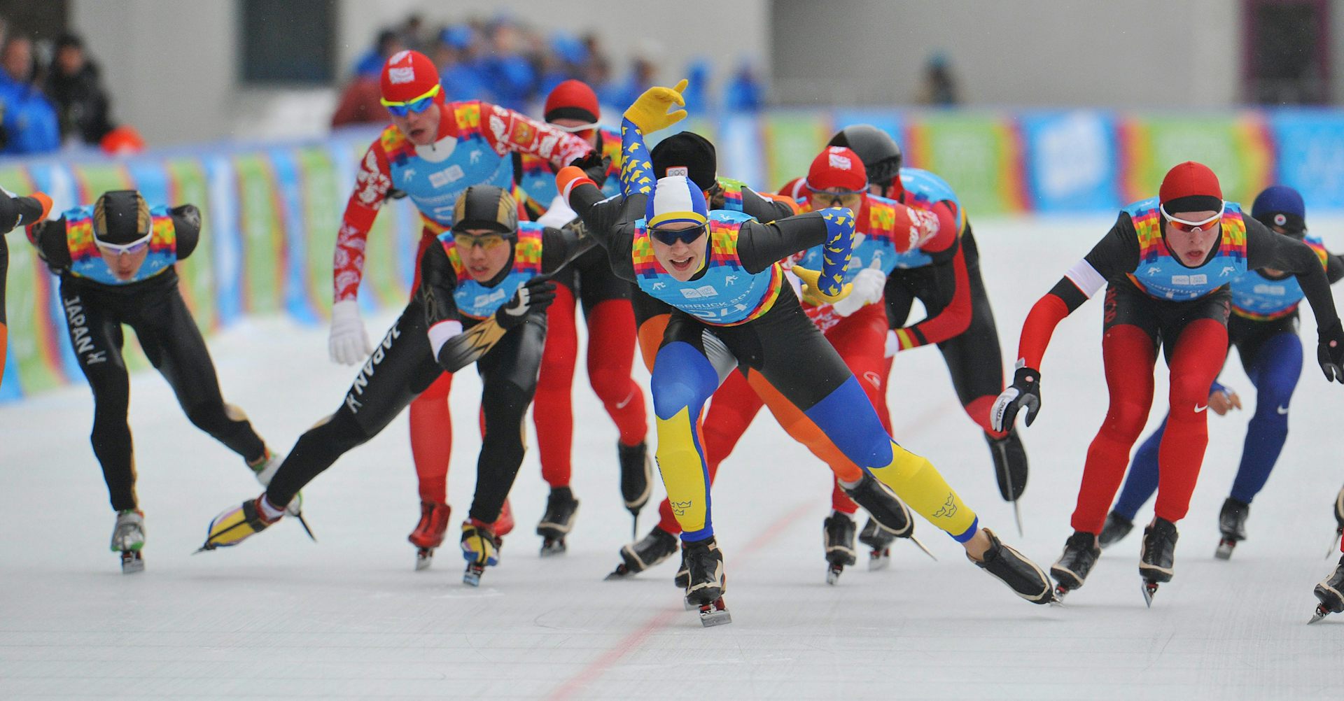 Athletes competing in speed skating
