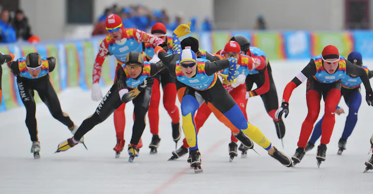 Athletes competing in speed skating