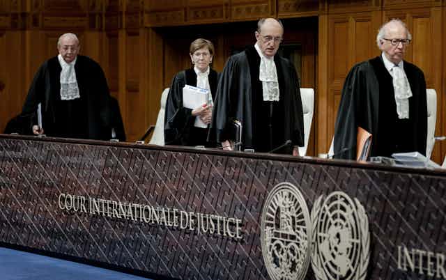 Four judges take their places for a hearing of the International Court of Justice at The Hague, January 2024.