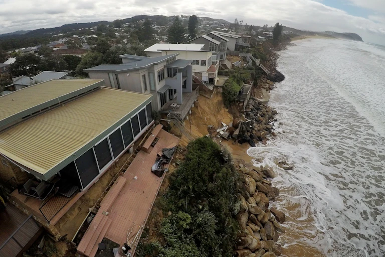 An eroding coast under seaside houses
