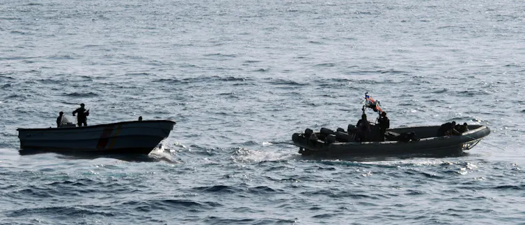 Two boats at sea.