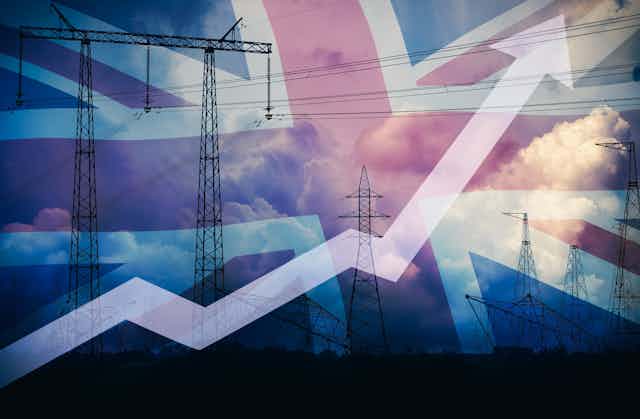 Upward pointing graph over industrial scene with UK flag background.
