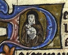 Manuscript drawing of a nun holding a lapdog.