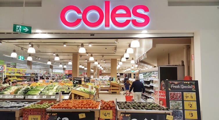 A Coles sign is displayed above a shop.
