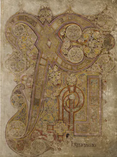 ornate detailing on a letter on the manuscript