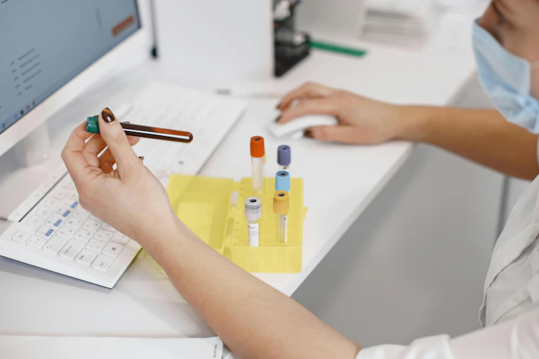 Medical staff working on computer
