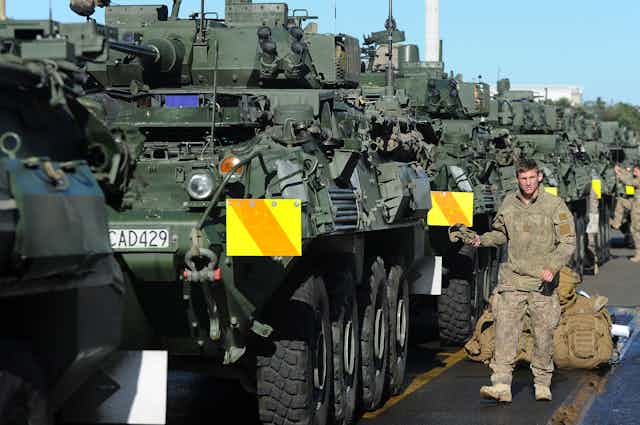 NZ Defence Force vehicles with soldier