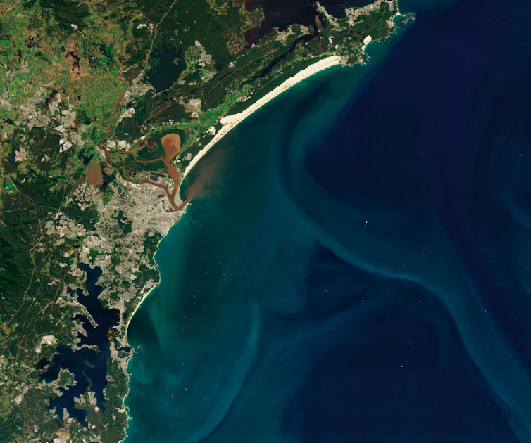satellite image of New South Wales coast with floodwaters going into sea