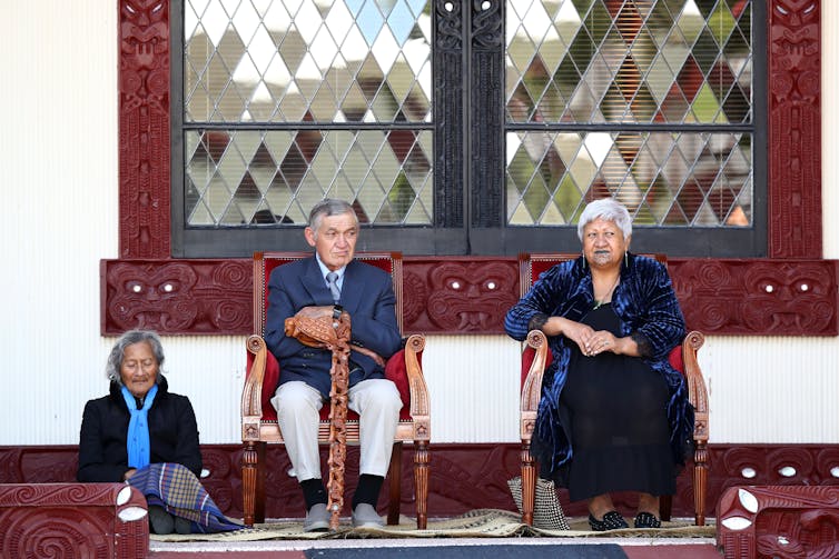 'Be who we are': King Tūheitia with Makau Ariki sitting at a powhiri (welcome)