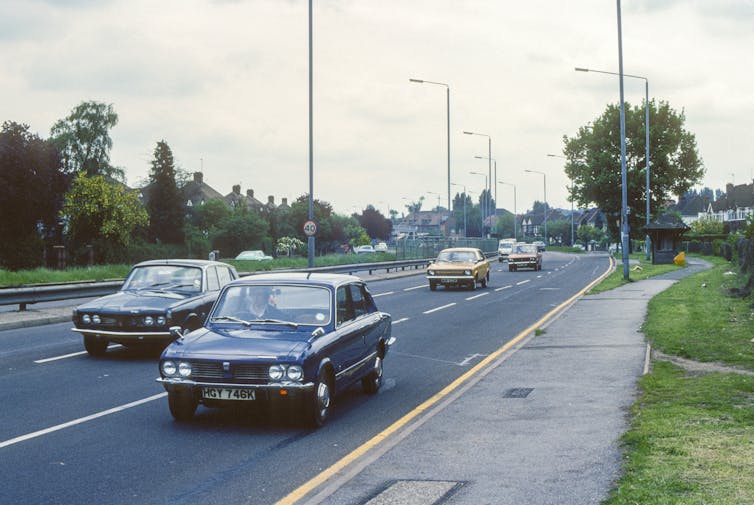 A vintage photo of cars on an English motorway.