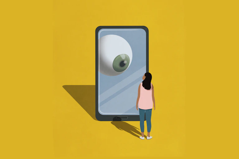 an illustration of a woman standing in front of a giant smartphone that has an eyeball on the screen looking at her