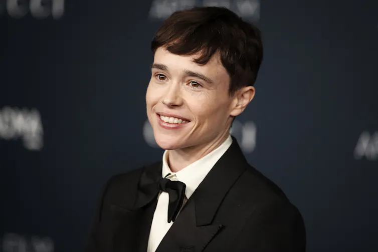 Elliot Page on a red carpet.