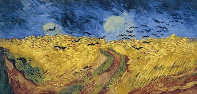 A Van Goch painting of a wheatfield with crows against a black and blue swirly sky.