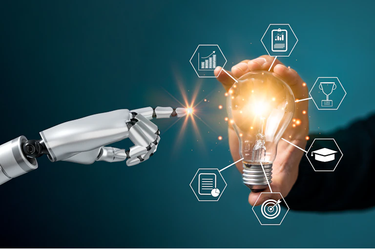 robot hand points to lightbulb