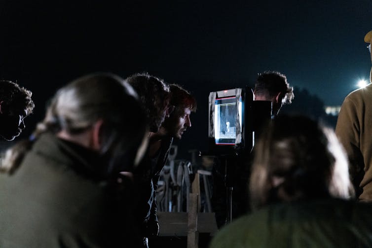 The crew of The Zone of Interest filming in the dark.