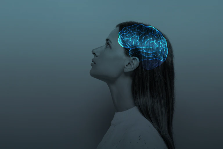 Graphic of a woman with the x-ray of her brain showing