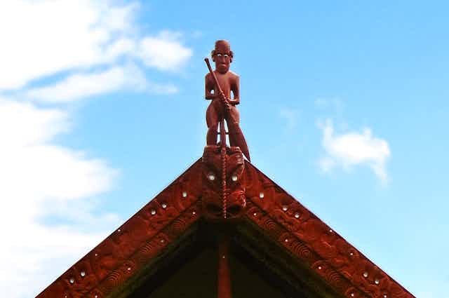 Carving on roof of Maori meeting house