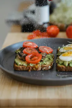Adding salt to avocado toast